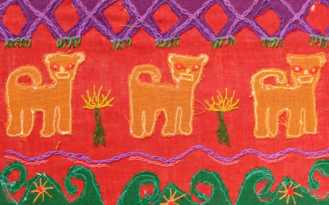 three embroidered lions